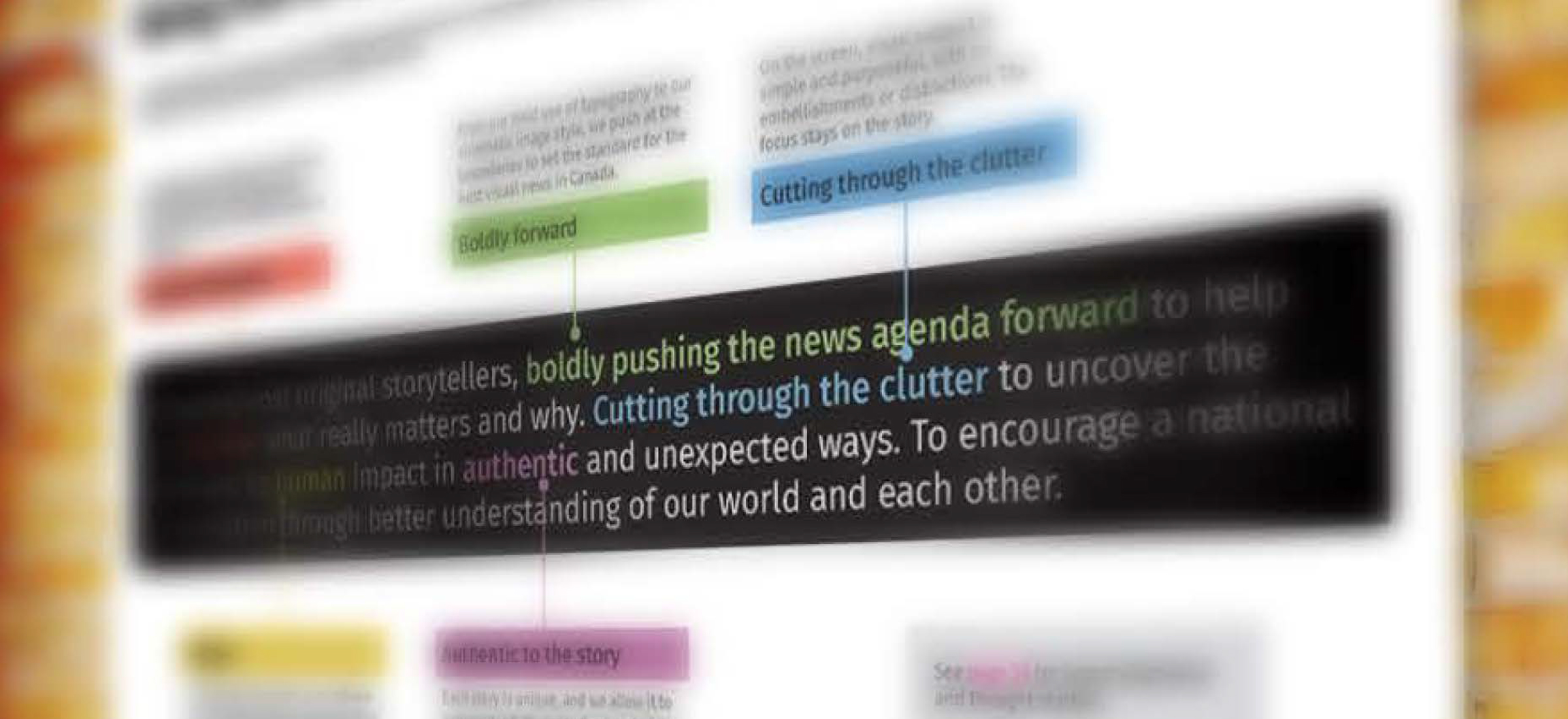 Image of The National's brand positioning strategy on a white board on the wall, partly blurred, with key words highlighted in different bright colour